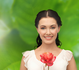 Image showing young and beautiful woman with flower