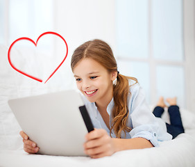 Image showing girl with tablet pc at home