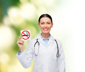 Image showing smiling female doctor with stethoscope