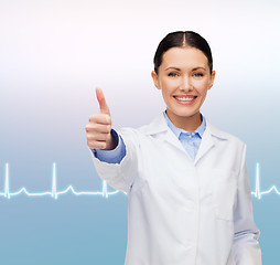 Image showing smiling female doctor showing thumbs up