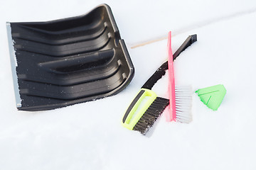 Image showing variety of snow cleaning equipment on snow