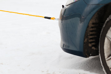 Image showing closeup of towed car with towing rope