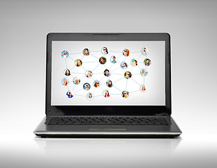 Image showing laptop computer with social network on screen