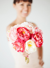 Image showing woman hands with bouquet of flowers