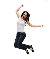 Image showing teenage girl in white blank t-shirt jumping