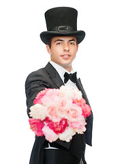 Image showing magician with flower bouquet