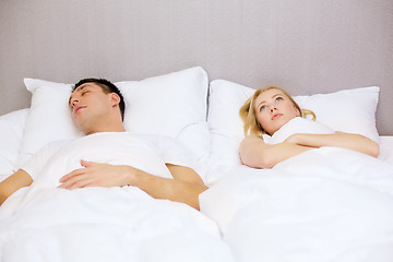 Image showing happy couple sleeping in bed