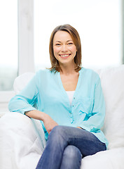 Image showing smiling woman at home