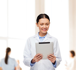 Image showing female doctor without stethoscope and tablet pc