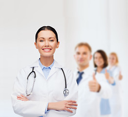 Image showing smiling female doctor with stethoscope