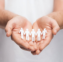 Image showing man hands with paper team