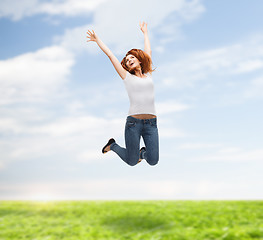 Image showing teenage girl in white blank t-shirt jumping