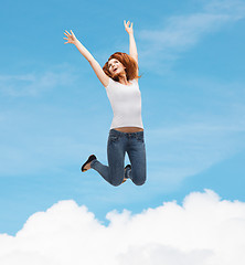 Image showing teenage girl in white blank t-shirt jumping