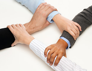 Image showing closeup of businesspeople hands united