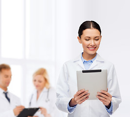 Image showing female doctor without stethoscope and tablet pc