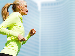 Image showing woman doing running outdoors