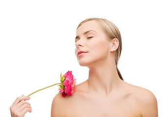 Image showing lovely woman with peonie flower