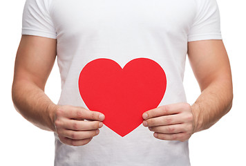 Image showing closeup of man hands with heart