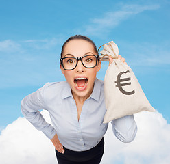 Image showing amazed businesswoman holding money bag with euro