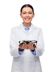 Image showing smiling female doctor without stethoscope