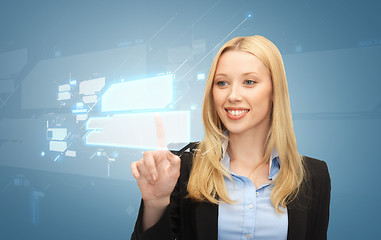 Image showing businesswoman working with virtual screens