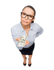 Image showing smiling businesswoman with dollar cash money