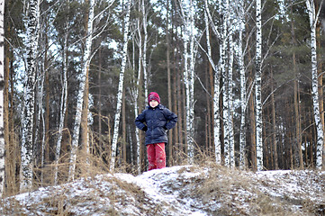 Image showing Portrait of the teenage boy in the snow-covered wood.