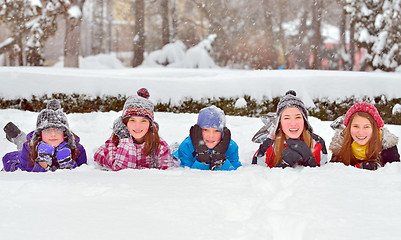 Image showing children on snow in winter time