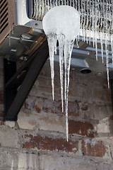 Image showing Icicle on icy air conditioner