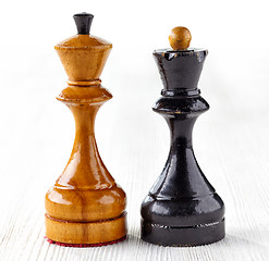 Image showing Two old wooden chess pieces