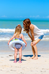 Image showing Mom daughter beach fun