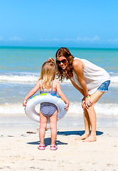 Image showing Mom daughter beach fun