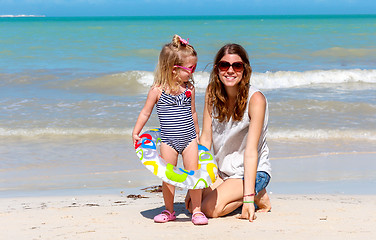Image showing Mom daughter beach fun