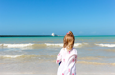 Image showing Girl staring  at the ocean