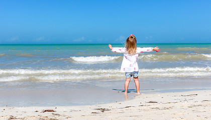 Image showing Girl staring  at the ocean