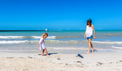 Image showing Mom daughter having a great time