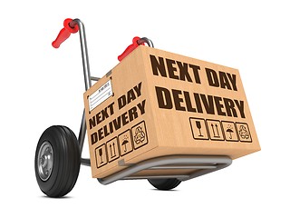 Image showing Next Day Delivery - Cardboard Box on Hand Truck.