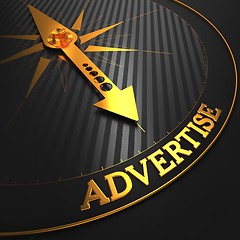 Image showing Advertise on Black and Golden Compass.