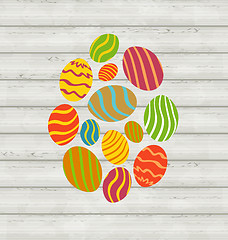 Image showing Easter ornamental eggs on wooden background