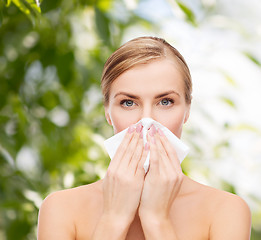 Image showing beautiful woman with paper tissue