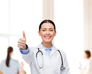 Image showing smiling female doctor with stethoscope