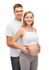 Image showing happy young family expecting child