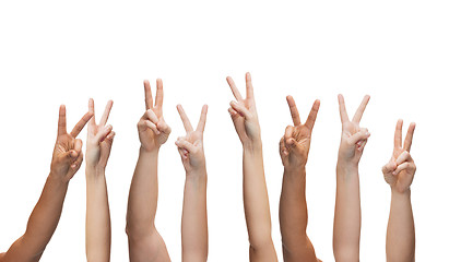 Image showing human hands showing v-sign