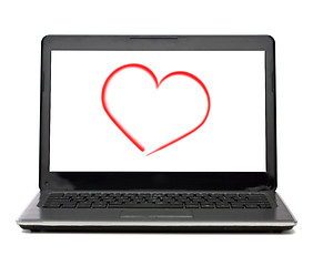 Image showing laptop computer with heart on white screen