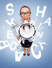 Image showing screaming businesswoman with megaphone