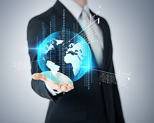 Image showing businessmans hand showing earth globe