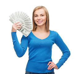 Image showing smiling girl with dollar cash money