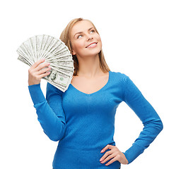 Image showing smiling girl with dollar cash money