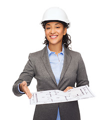 Image showing businesswoman in white helmet with blueprint