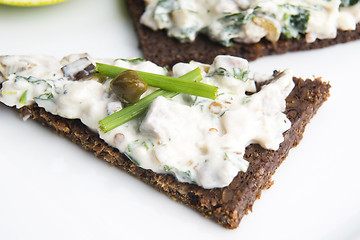 Image showing sandwiches with dark bread, herrings, mushrooms, pepper